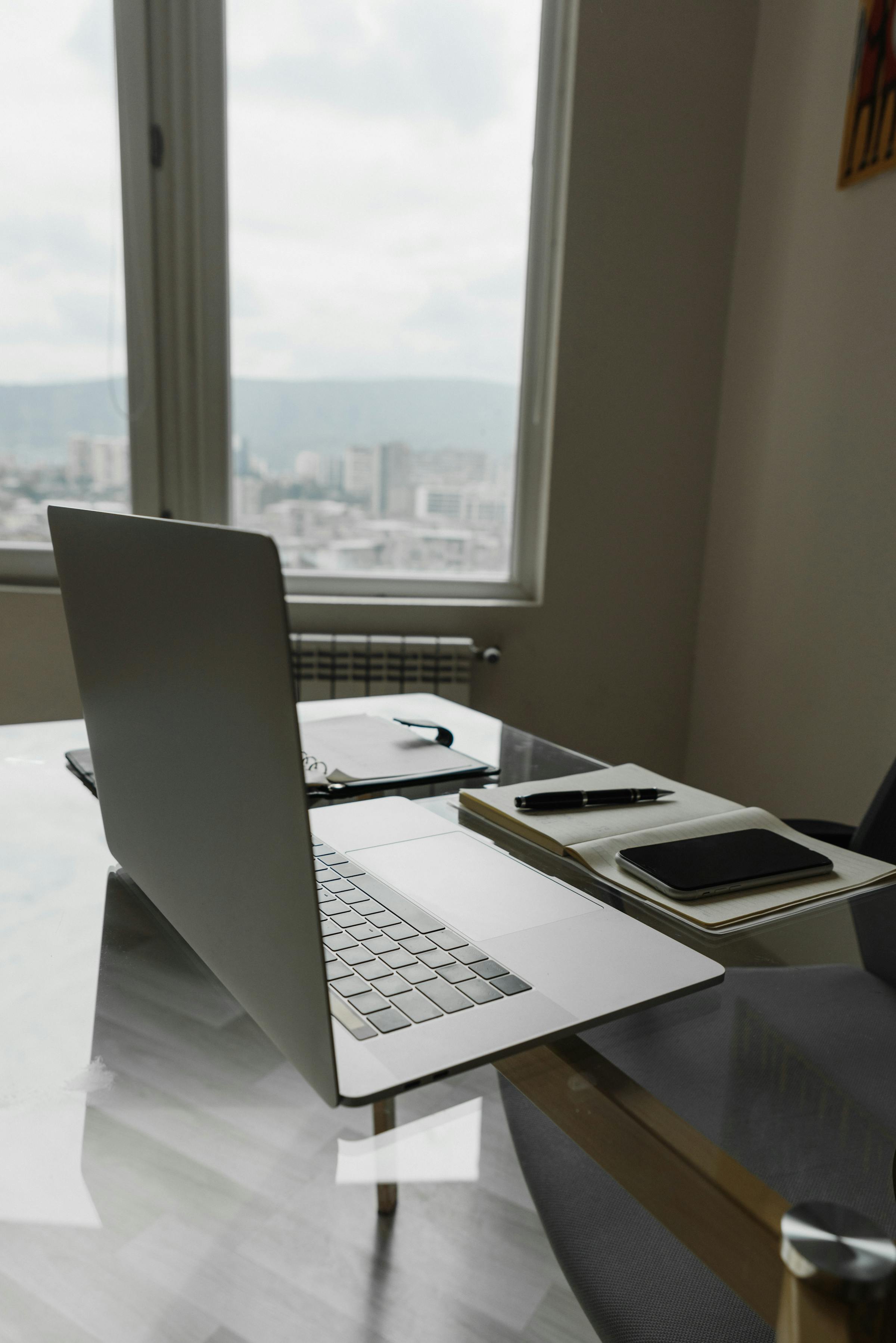 A bright, minimal workspace by a window
